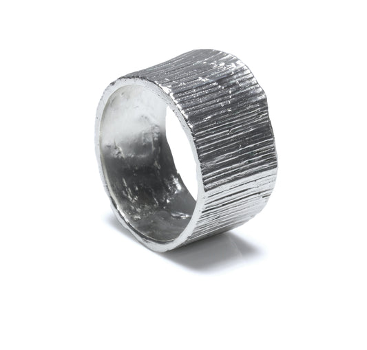 Textured very large silver ring. Rock and roll style suiting large hands.