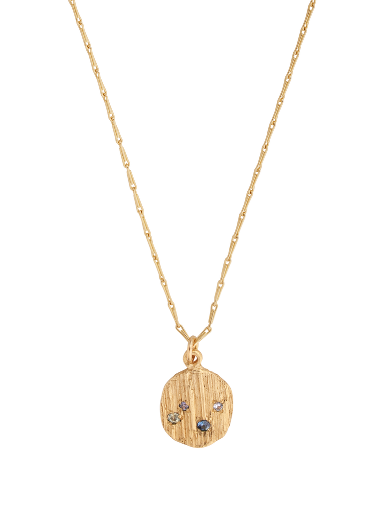 Picture of gold necklace with textured pendant set with 4 blue sapphires. 