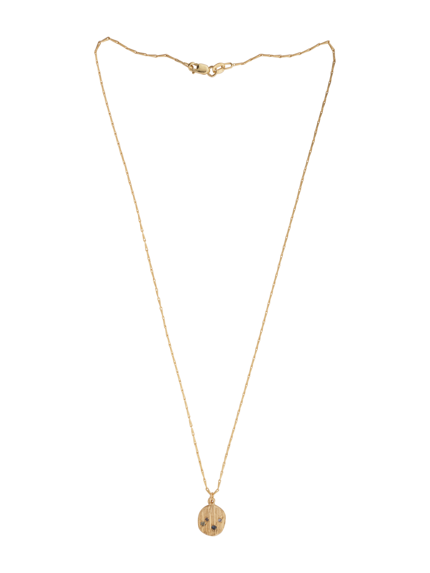 Picture of gold necklace with textured pendant set with 4 blue sapphires. Full length shot showing chain also.