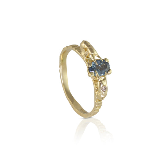 Blue sapphire crab claw handmade engagement ring with diamond for the alternative bride.