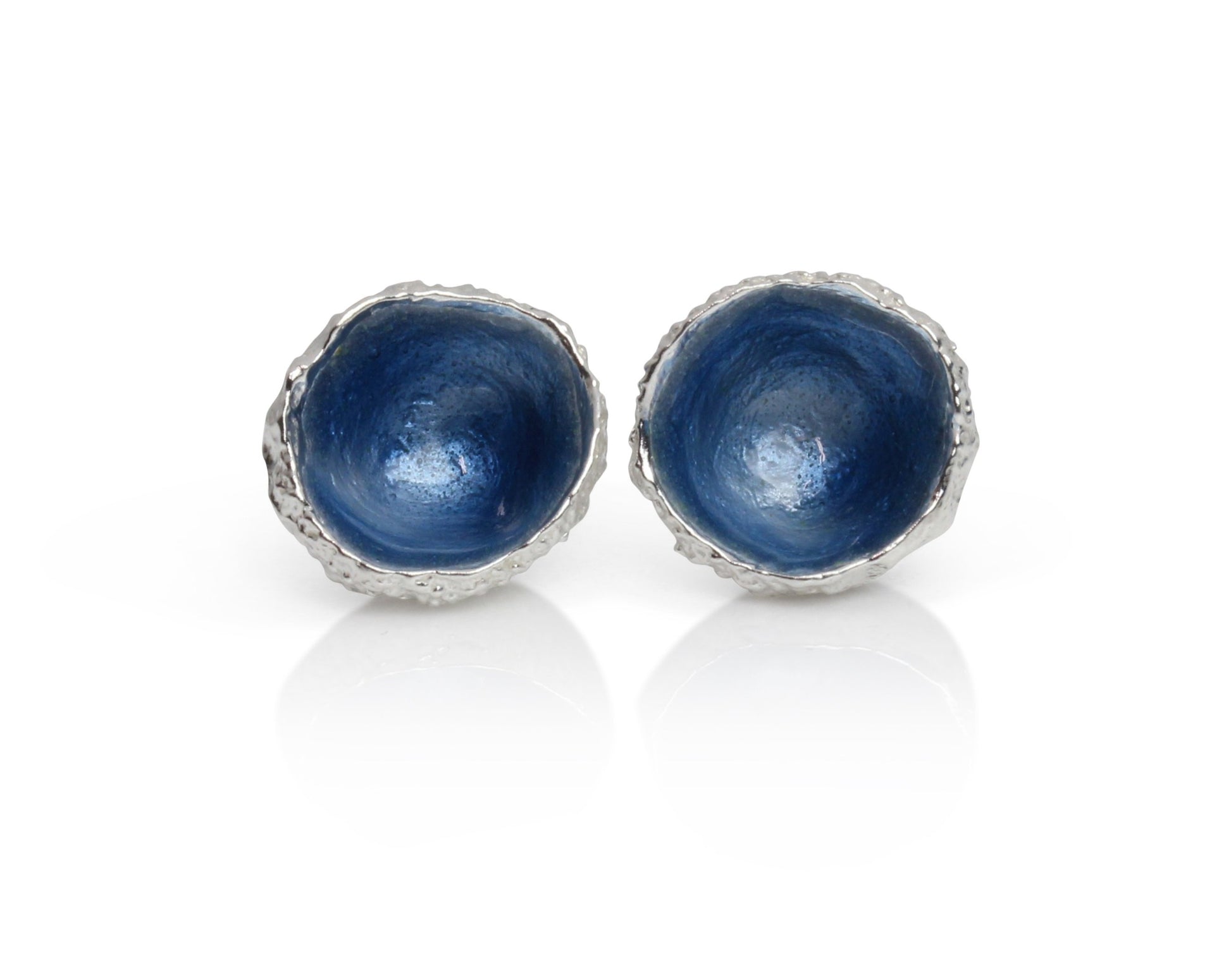 Silver enamel studs cast from acorns with hand fired blue enamel
