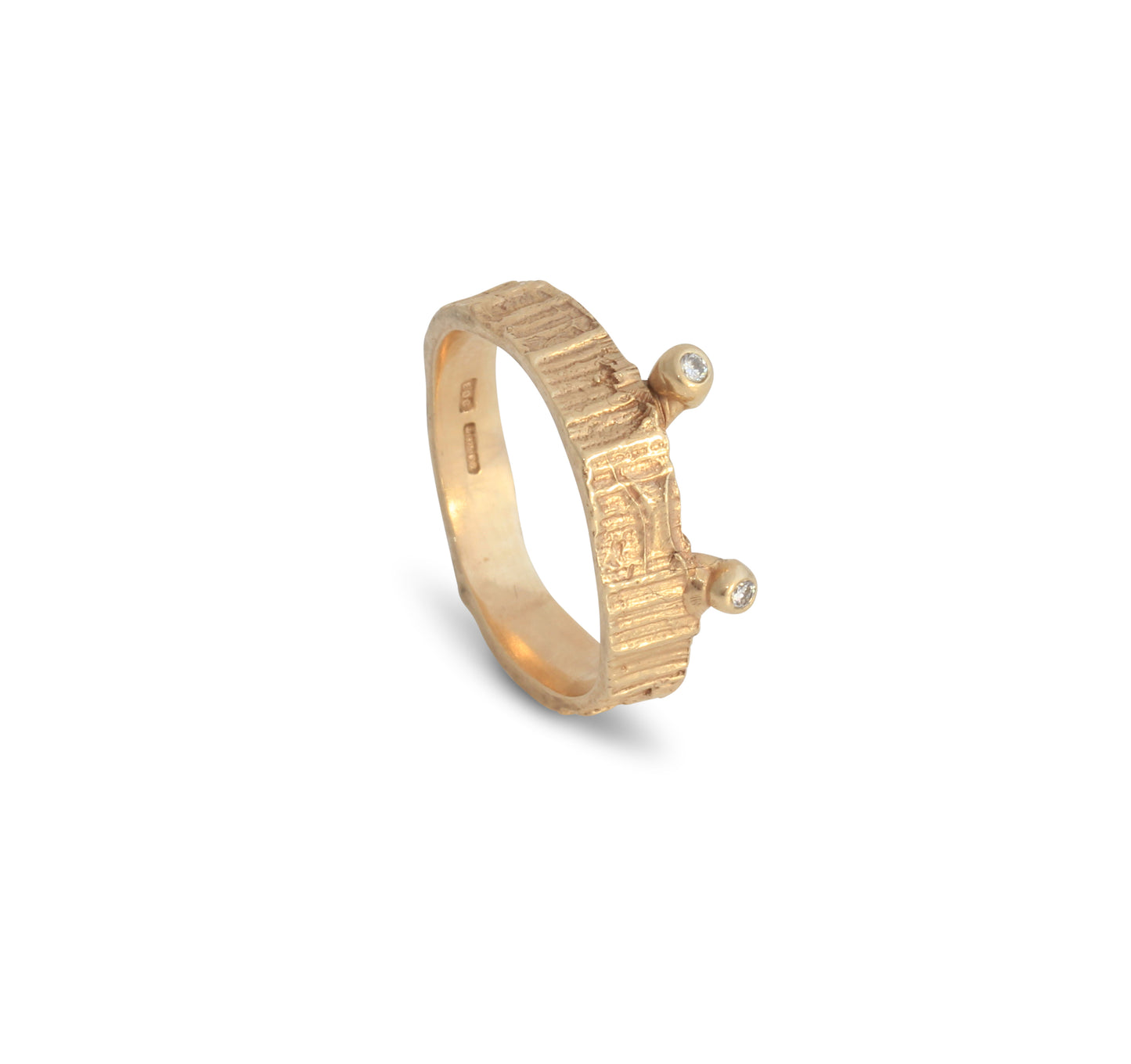 Yellow gold alternative wedding ring with diamond eyes like a crabs.