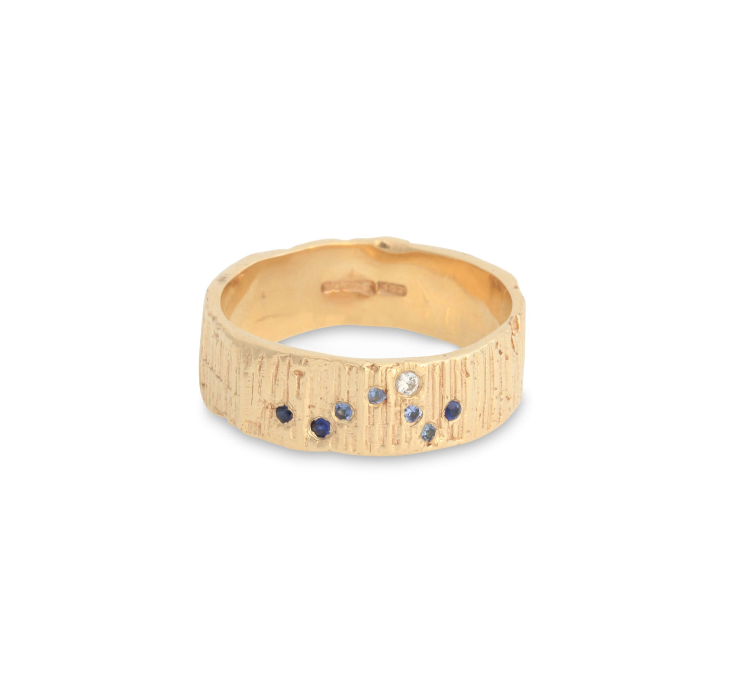 Ring with sapphires in the shape of a wave. 6mm wide alternative wedding band with ripples.  Perfect surfer girl ring