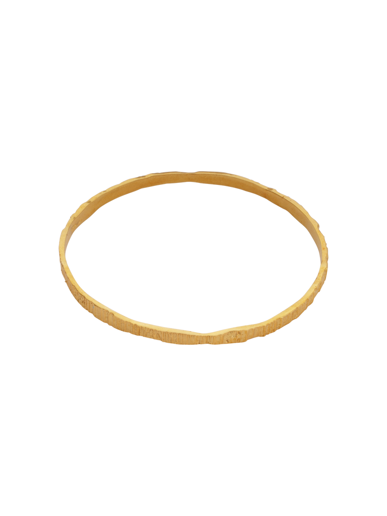 Picture of a gold textured bracelet with bark texture in.  
