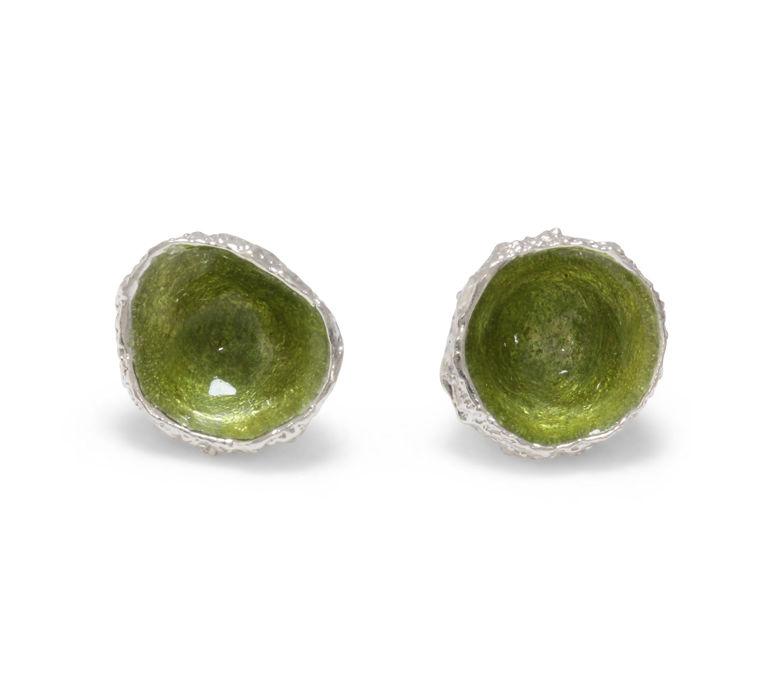 Earrings cast from little acorns into silver. Enamelled with olive green enamel like river weed