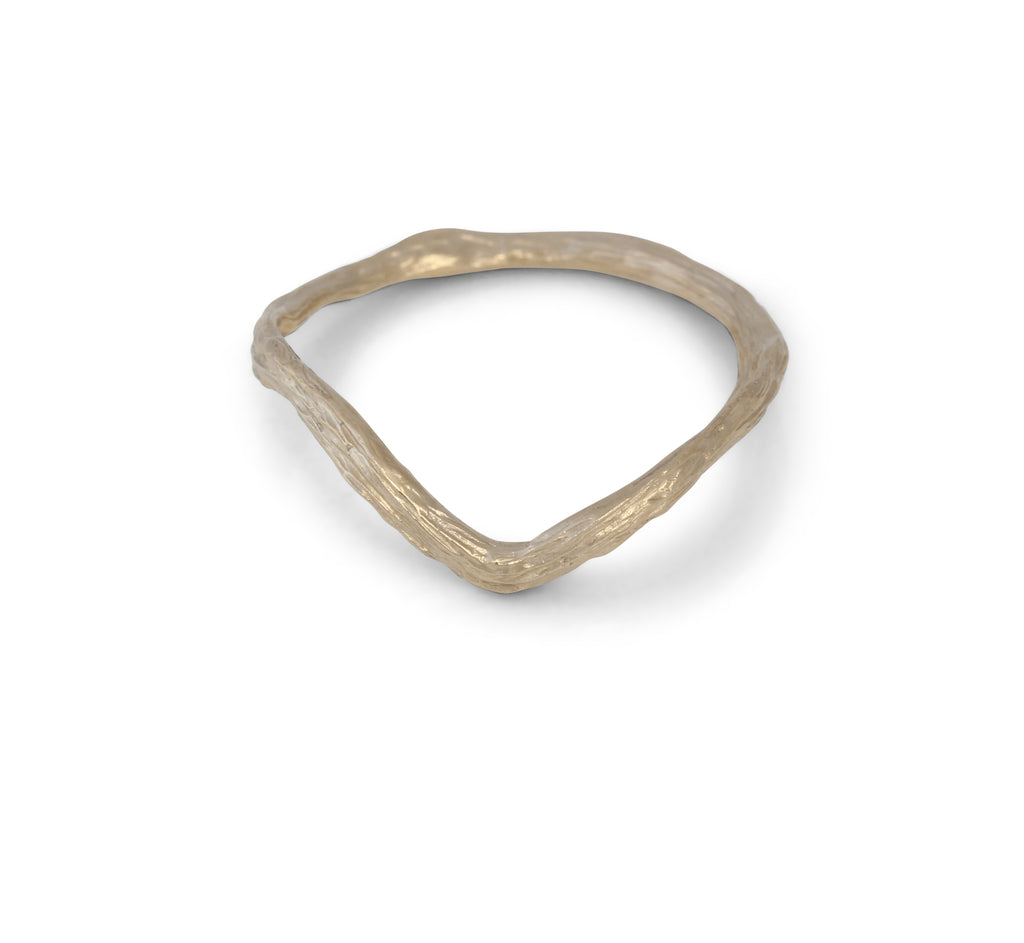 Twig textured ring cast in gold. It has a V / Chevron shape so fits with other rings.