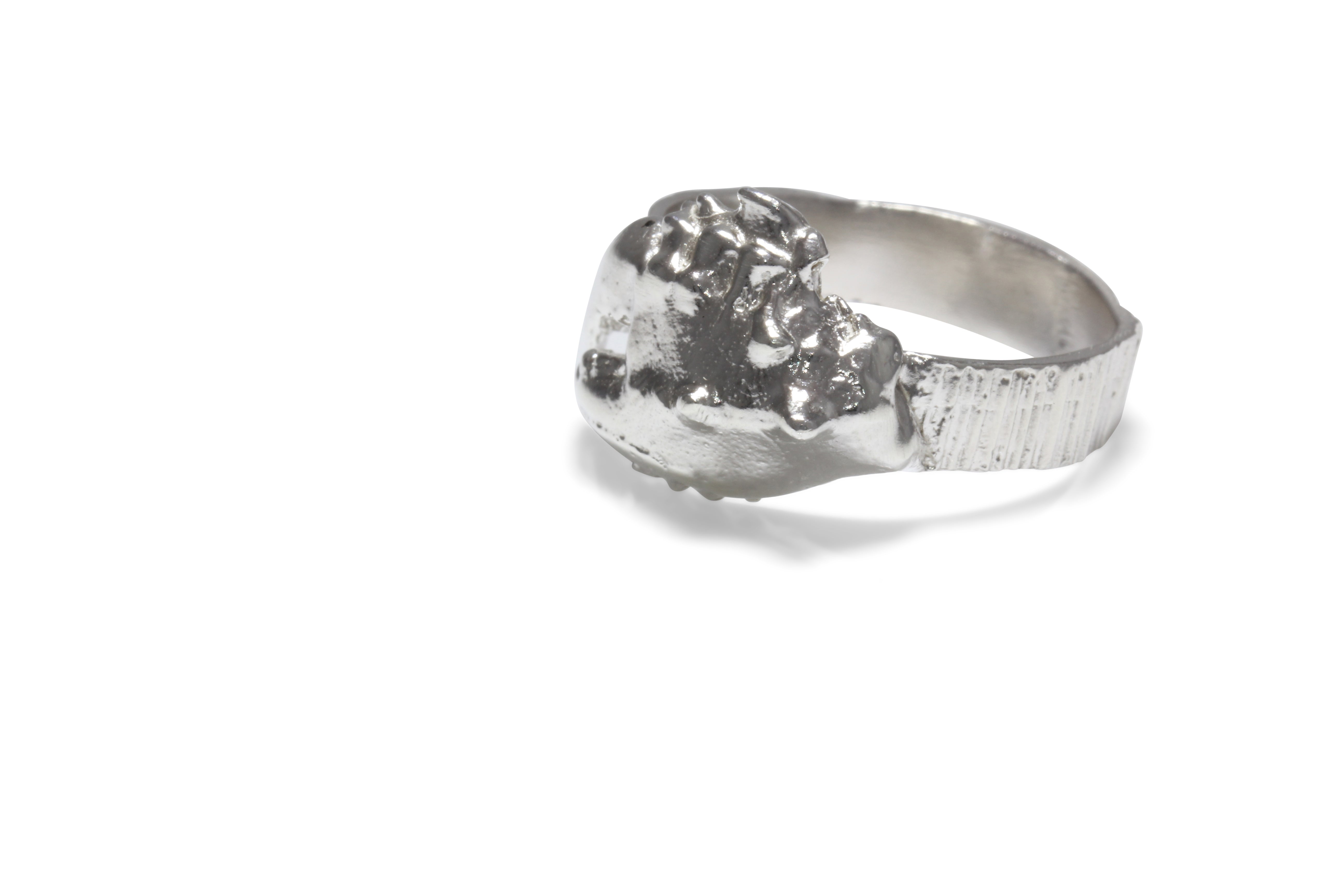 Side view of silver ring perfect gift for tattoo artist. 