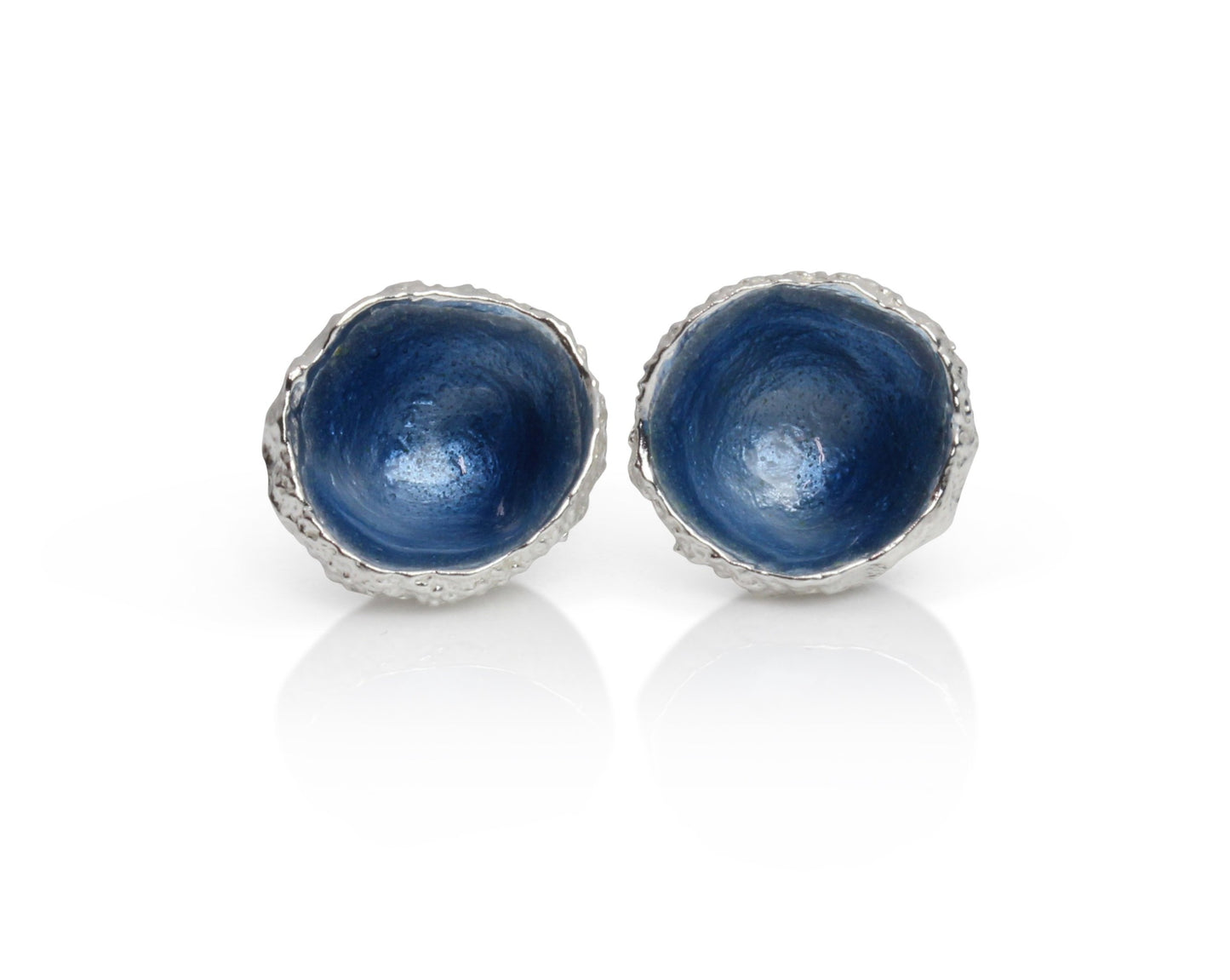Silver enamel studs cast from acorns with hand fired blue enamel 