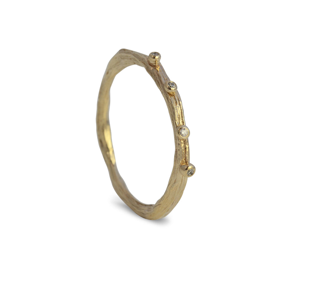 Dainty gold ring cast from a twig with tiny diamonds on the top. Handmade in Bristol by Irish jeweller Eily o connell. 