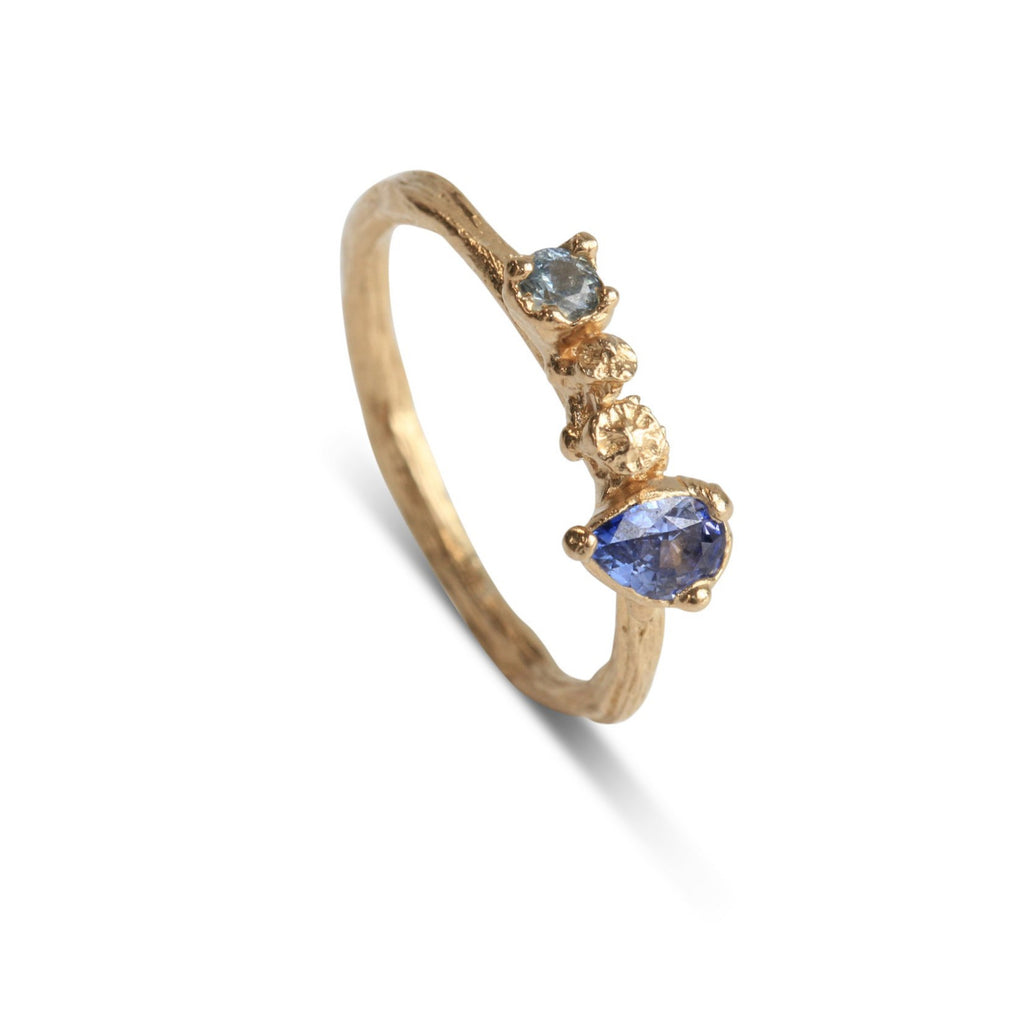 Unique gold engagement ring with pear sapphire and berry details. Handmade in 14 carat yellow gold by Bristol based artist jeweller.